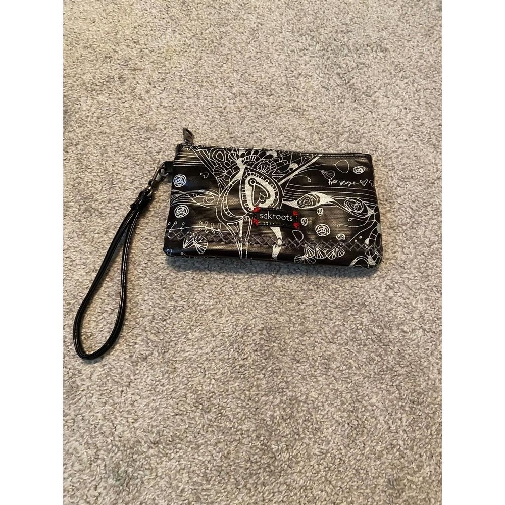 Sak roots wristlet wallet rechargeable battery inside